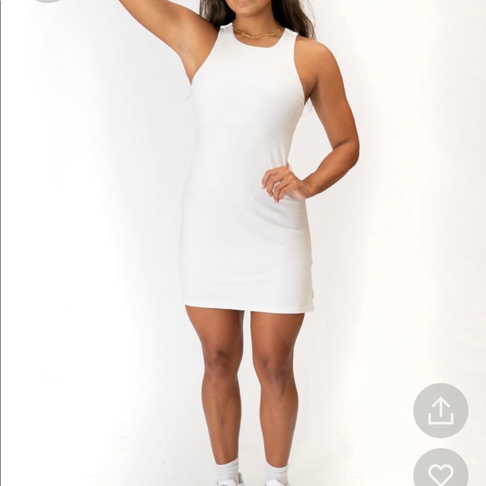 NWT Paragon Active dress. Super cute and stretchy, built in bra. Never worn!